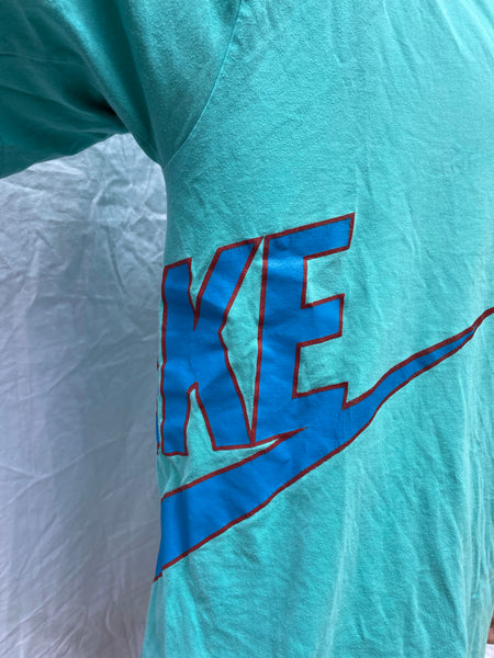 Vintage Nike Aqua T-shirt with all over logos