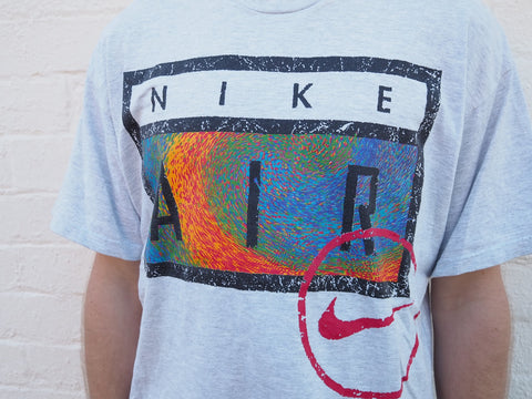 Nike Air Grey T-shirt. Multi coloured logo